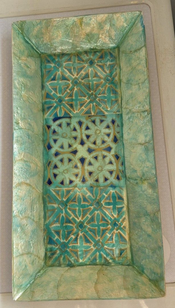 Decorative Rectangular Seashell Tray (Category: Other Home Decor) located in Singapore. Submitted by happiness09 (Listing ID 1427532499, Image 1). Description: Handmade turquoise seashell tray. Beautiful and elegant with unique designs. Natural vibrant colour with a mix of hand-painted gold designs. Ideal for display on its own or displaying decorative items. Length: est 40cm Breadth: est 20cm.