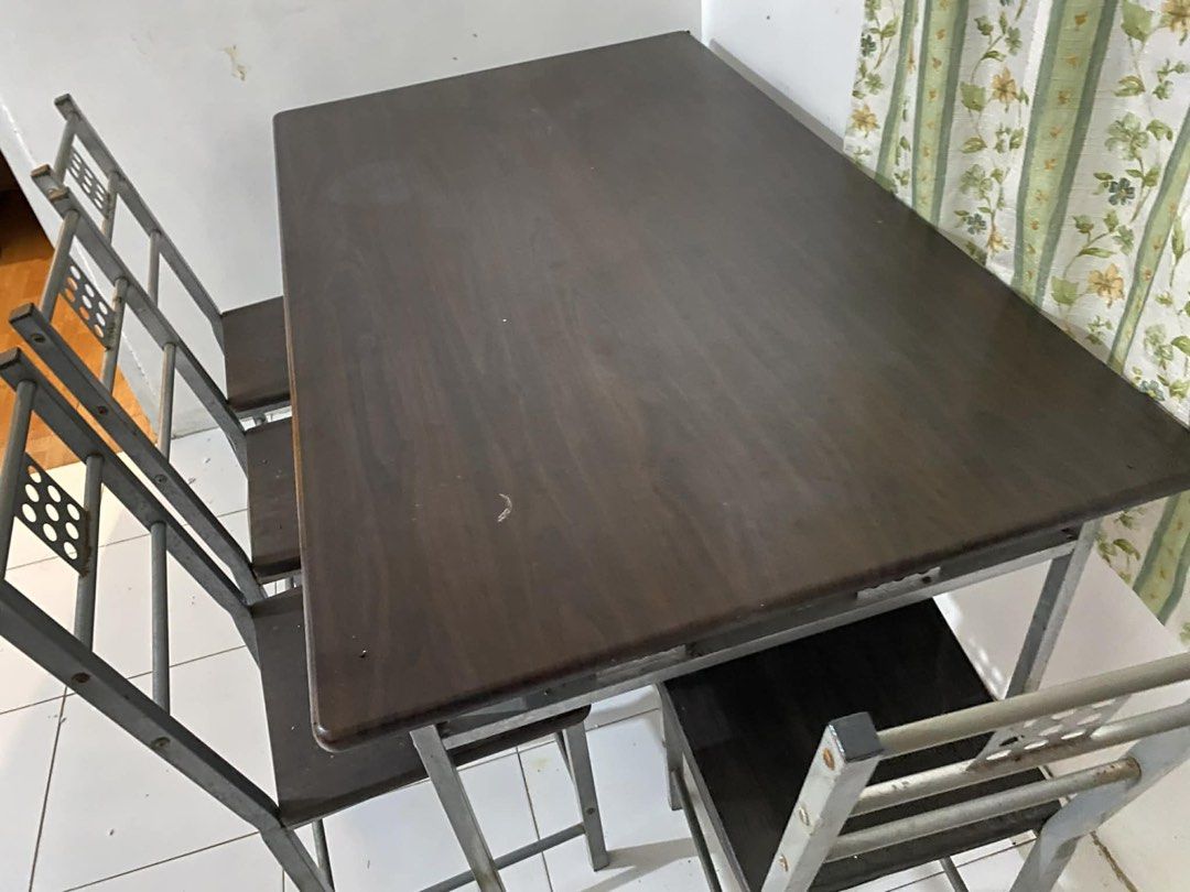URGENTLY DECLUTTERING: Dining Table with 4 Chairs (Category: Tables & Sets) located in Marikina City. Submitted by declutteringmommm (Listing ID 1427583632, Image 1). Description: As is where is. Sturdy. Just that the frames are a lil bit old and some bits of rust. Does not affect the function. Can be re-painted and it will all look new. From Santa Rosa, Laguna. .