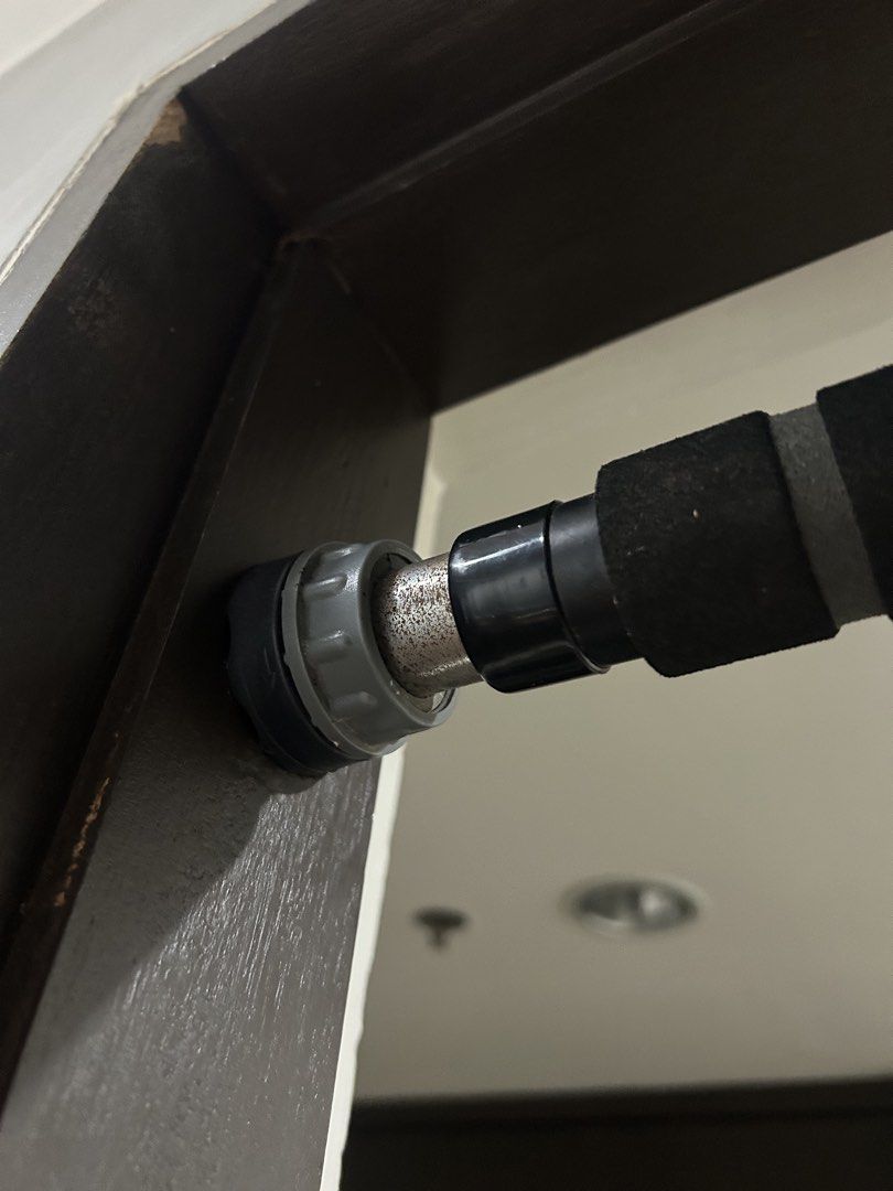 Doorway Pull-up Bar (Category: Weights & Dumbbells) located in Mandaluyong City. Submitted by ncooooooo (Listing ID 1427565292, Image 3). Description: Pull up bar for door-way - Supports 100kg (accdg. to label) - With screw tightening mechanism for a secure fit. Item was barely used and accumulated minimal rust over time. Handles are still in great condition. RFS: The door frame in my apartment is kinda soft for this kind of bar. Still negotiable