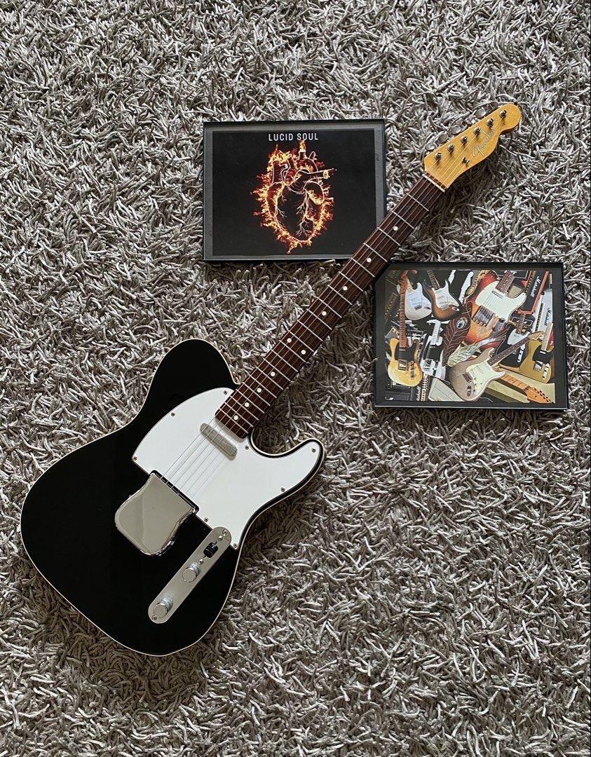 Fender 62 Telecaster Tuxedo Black (Category: Musical Instruments) located in Makati City. Submitted by robma_ (Listing ID 1398891570, Image 1). Description: Fender Telecaster 62ri Crafted in Japan - Rare in Black Tuxedo with Ivory bindings - Alder body, maple neck, rosewood board - Color no longer in production for this model in Japan The best sounding 62ri Telecaster I found in Tokyo .