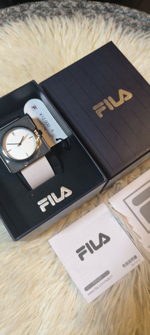 FILA White Square Face Watch - Quartz Miyota Movement (Category: Women's Watches) located in Manila. Submitted by Ms.Joycee (Listing ID 1427536321, Image 2). Description: • Model: 38-022 Series • Unisex Watch • Genuine Leather (White belt) • Stainless Steel Case • Water Resistant 3 ATM Complete inclusion: -price tag -original box -International warranty -owner's manual Unused item Bought in Japan Plastic are still intact.