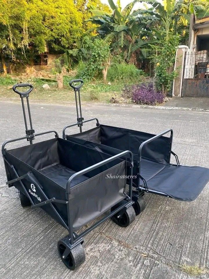 FlashFish Foldable Storage Control Car (Category: Strollers) located in Makati City. Submitted by oideme (Listing ID 1427491878, Image 3). Description: FlashFish foldable wagon is perfect for carrying items. It features a black fabric body and a sturdy frame. The wagon can hold up to 120KG. It is foldable for easy storage and transport. The wagon has a handle for pulling and large wheels for easy maneuverability. It is ideal for outdoor activitie