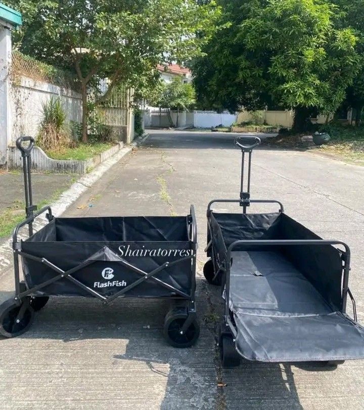 FlashFish Foldable Storage Control Car (Category: Strollers) located in Makati City. Submitted by oideme (Listing ID 1427491878, Image 2). Description: FlashFish foldable wagon is perfect for carrying items. It features a black fabric body and a sturdy frame. The wagon can hold up to 120KG. It is foldable for easy storage and transport. The wagon has a handle for pulling and large wheels for easy maneuverability. It is ideal for outdoor activitie