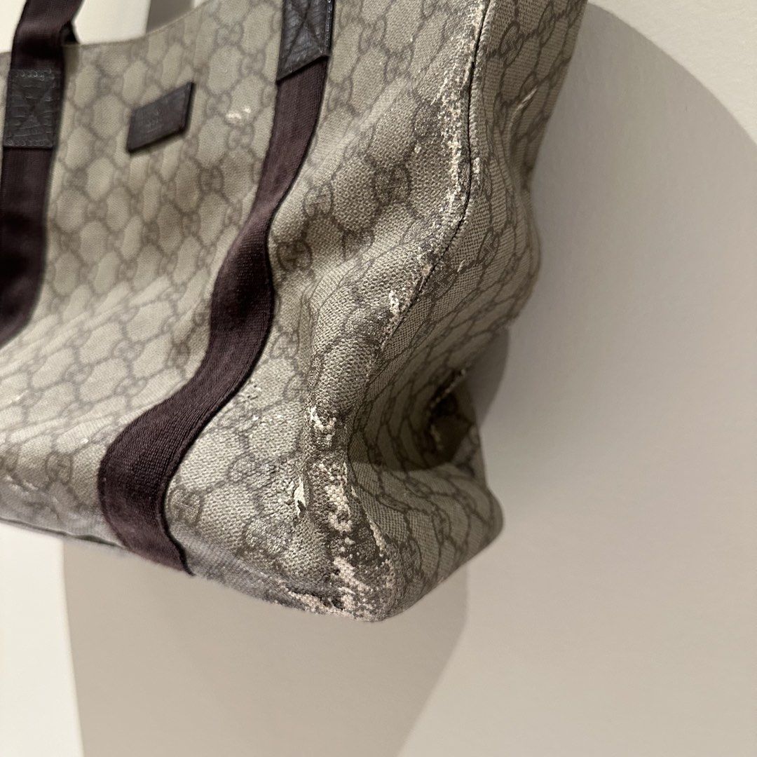 Gucci GG Canvas Tote Bag (Category: Luxury Bags & Wallets) located in Pasay City. Submitted by do.es (Listing ID 1427626070, Image 2). Description: My mother-in-law gave it to me & asked if I wanted to repair and use it. Never got the chance to (was thinking to put patch designs) ans i might not have the time to ever do it. It’s authentic! Negotiable price given the outer damage. Other than the cracks, material of the handle is still good and the