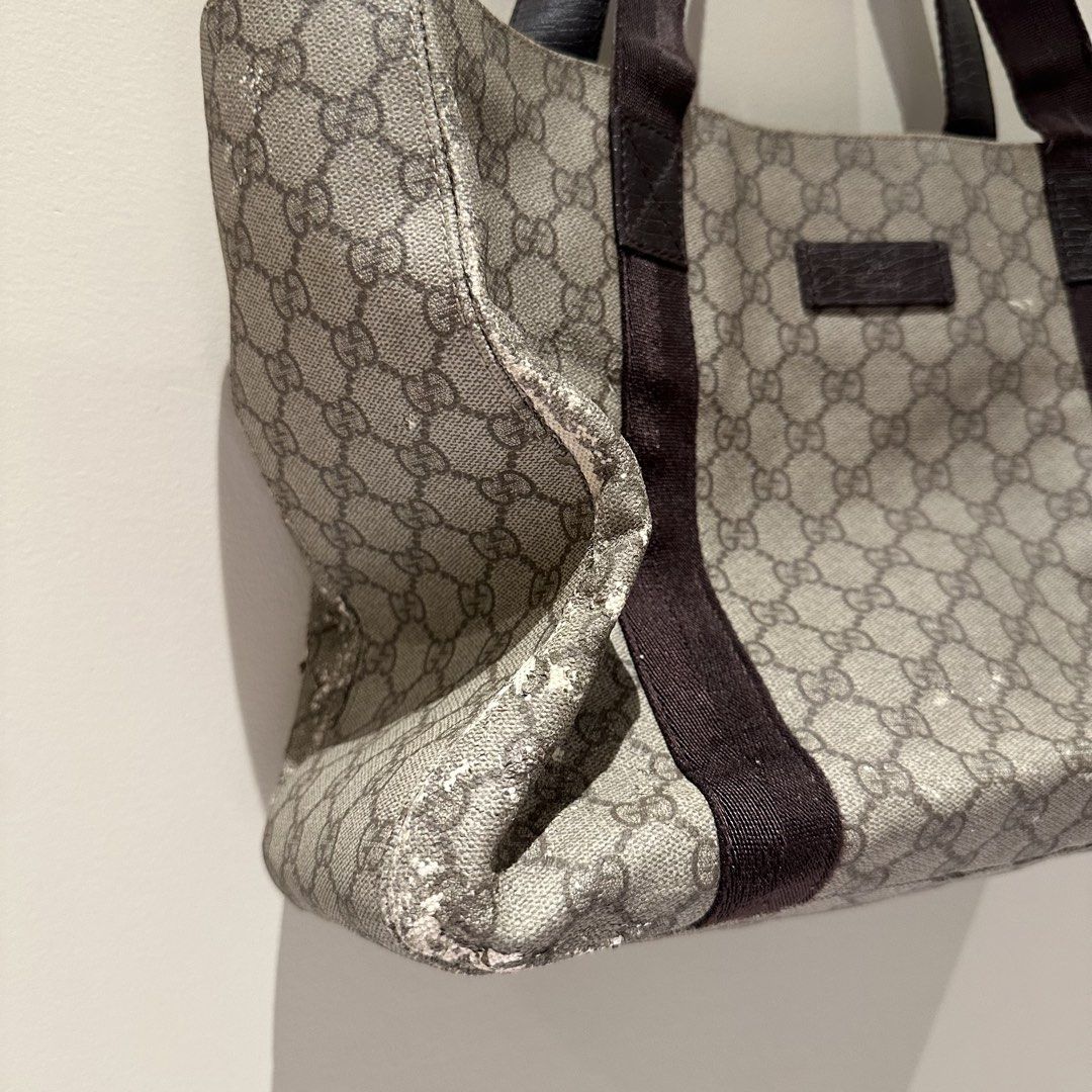 Gucci GG Canvas Tote Bag (Category: Luxury Bags & Wallets) located in Pasay City. Submitted by do.es (Listing ID 1427626070, Image 3). Description: My mother-in-law gave it to me & asked if I wanted to repair and use it. Never got the chance to (was thinking to put patch designs) ans i might not have the time to ever do it. It’s authentic! Negotiable price given the outer damage. Other than the cracks, material of the handle is still good and the
