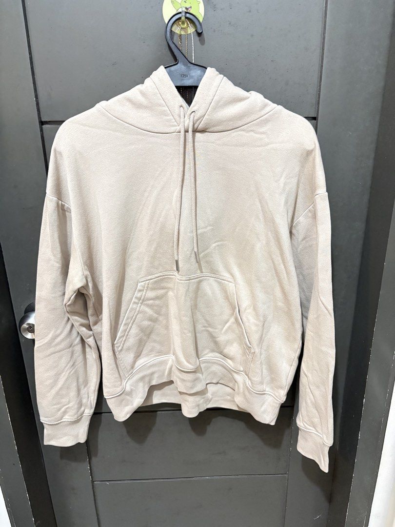 H&M Beige Hoodie - Size S (Category: Coats, Jackets and Outerwear) located in Quezon City. Submitted by ceeceee_ (Listing ID 1427554823, Image 1). Description: - H&M beige hoodie - Size: S - Features: Hood with drawstring, kangaroo pocket - Color: Neutral beige - Material: Soft and comfortable - Perfect for casual wear.
