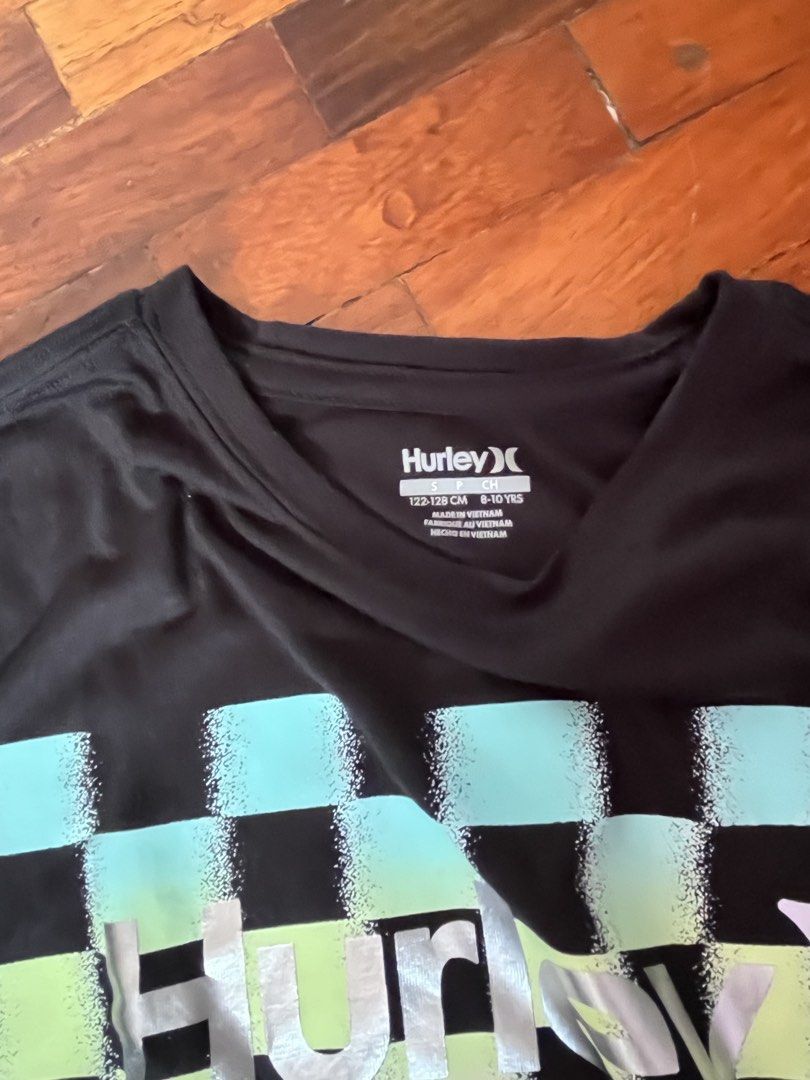 Hurley Checkered Graphic T-shirt (Category: Shirts) located in Muntinlupa City. Submitted by ysabeb (Listing ID 1427560603, Image 2). Description: .