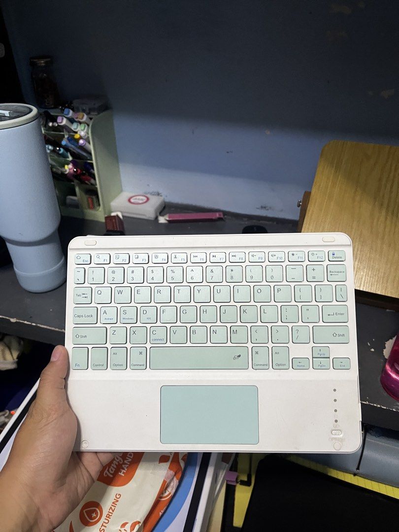 IPAD OR TABLET KEYBOARD (Category: Computer Keyboard) located in Manila. Submitted by yewnis_teps (Listing ID 1427624550, Image 1). Description: - Green iPad keyboard - Got it from shoppee during the pandemic and never got to use it fully - Uses a Micro USB as a charger (old android charger) RFS: Decluttering .