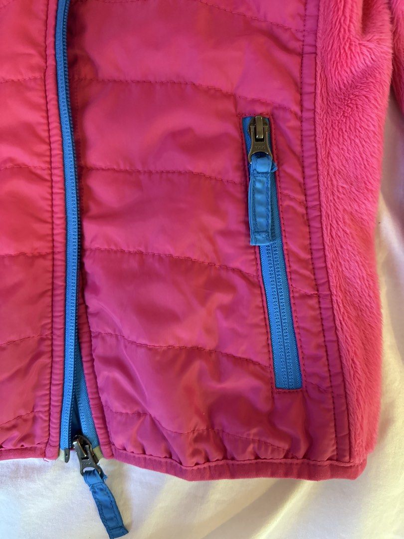 Kids' Pink Hooded Jacket 7-9yo (Category: Babies & Kids Fashion) located in Muntinlupa City. Submitted by shopnb (Listing ID 1427493138, Image 2). Description: - Pink hooded jacket for girls. - Designed for ages 7-9 years old. - Features fleece sleeves and a quilted front. - Vibrant pink color with blue lining and zippers..