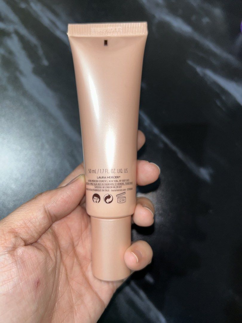 Laura Mercier Pure Canvas Primer Illuminating (Category: Makeup) located in Valenzuela. Submitted by jamcolecciones (Listing ID 1427606841, Image 2). Description: Laura Mercier Pure Canvas Primer Illuminating. This primer is silicone-free. It is 50 ml / 1.7 fl. oz. The product is in a peach-colored tube. The back of the tube has product information. Made in Italy..