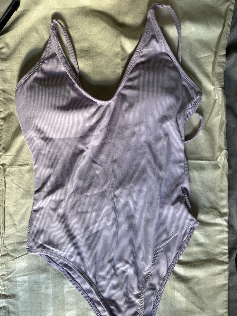 Lavender One-Piece Swimsuit (Category: Bikinis & Swimsuits) located in Quezon City. Submitted by pamnly (Listing ID 1427612564, Image 1). Description: Lavender one piece swimsuit Size SMALL 250.