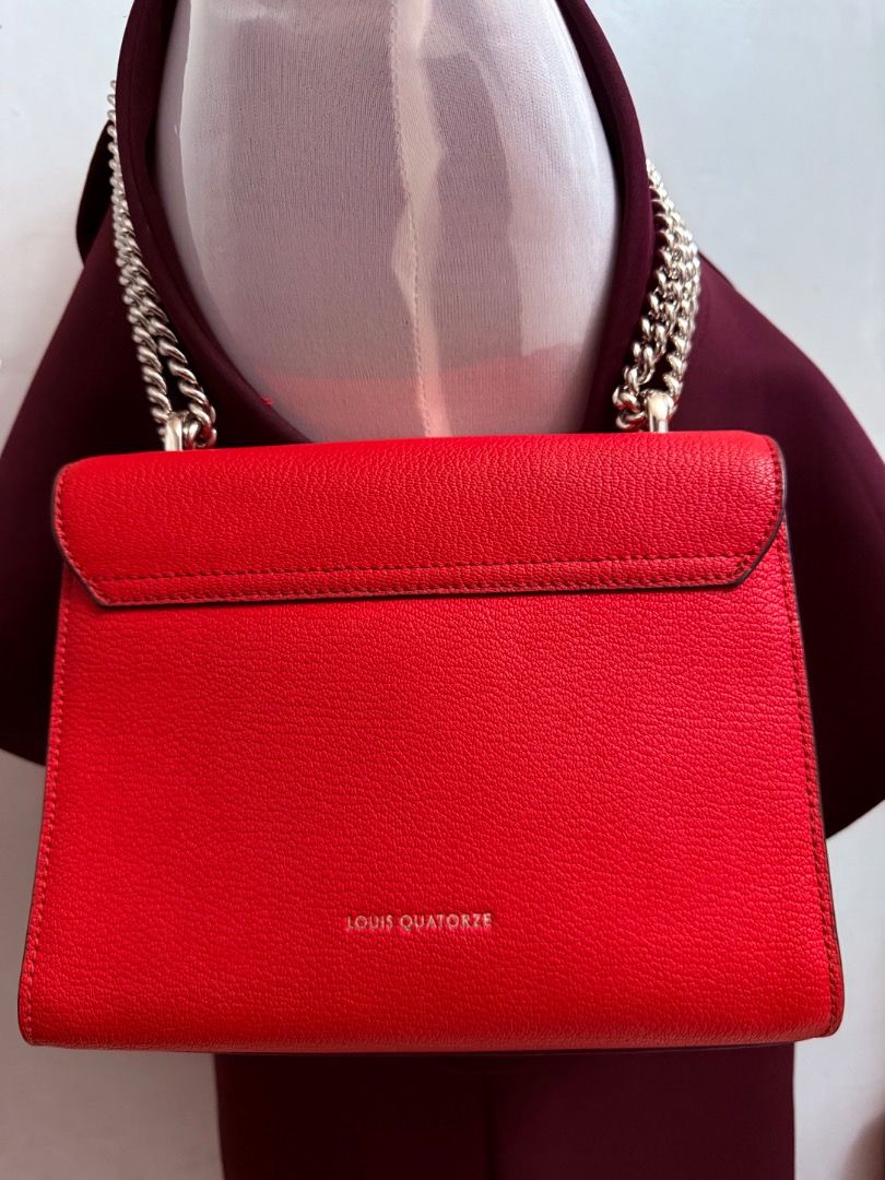 Louis Quatorze Red Leather Purse (Category: Luxury Bags & Wallets) located in Cotabato. Submitted by goldenhiveph0826 (Listing ID 1427500693, Image 3). Description: ✅Genuine leather with silver chain strap • Compact, stylish design • Flap closure with silver clasp • Interior zippered pocket, gray lining • Versatile shoulder or handbag ✅UsedOnceOnly✅ 🚫Condition🚫 • Minor wear marks around clasp • Possible minor scratches/scuffs on leather (see ph