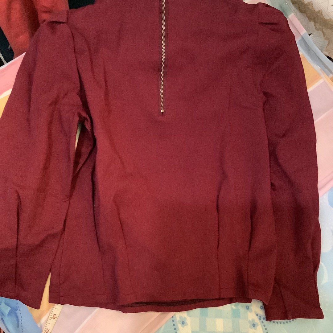 Maroon Ruffle Neck Blouse (Category: Blouses) located in Cabanatuan. Submitted by chieezyx (Listing ID 1427557615, Image 2). Description: asymmetrical sleeves.