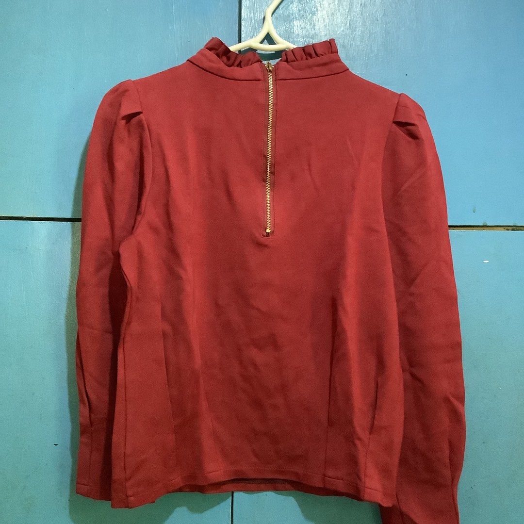 Maroon Ruffle Neck Blouse (Category: Blouses) located in Cabanatuan. Submitted by chieezyx (Listing ID 1427557615, Image 1). Description: asymmetrical sleeves.