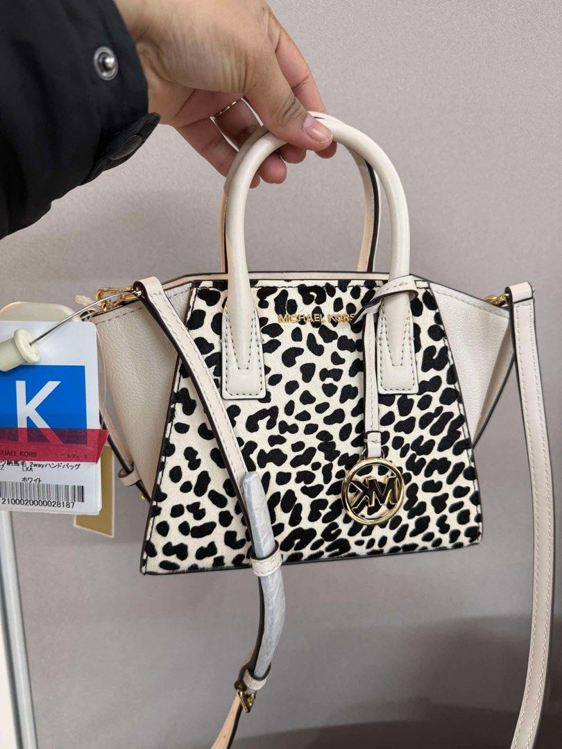 Michael Kors Avril Small Satchel (Category: Luxury Bags & Wallets) located in Muntinlupa City. Submitted by yang2nd (Listing ID 1427573110, Image 1). Description: ✔️💯% Authentic Item ✔️💯% Looks Like New ✔️💯% genuine calf hair featuring a printed cheetah/leopard pattern ✔️gold-tone polished metal for the “MK” charm, zippers, and strap ✔️with tag ▪️Origin: Japan🇯🇵 ▪️For Reservation: 50%DP.