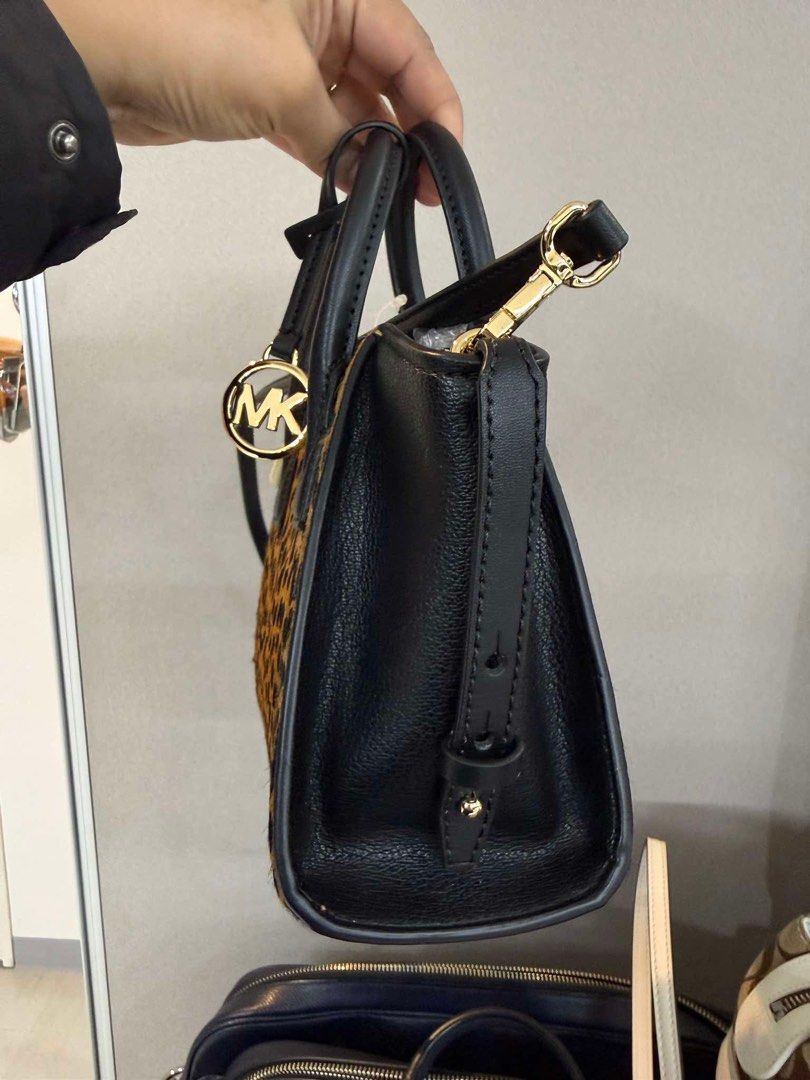Michael Kors Avril Small Top-Handle Satchel (Category: Luxury Bags & Wallets) located in Muntinlupa City. Submitted by yang2nd (Listing ID 1427574641, Image 3). Description: ✔️💯% Authentic Item ✔️💯% Looks Like New ✔️💯% genuine calf hair featuring a printed cheetah/leopard pattern ✔️gold-tone polished metal for the “MK” charm, zippers, and strap ✔️with tag ▪️Origin: Japan🇯🇵 ▪️For Reservation: 50%DP.