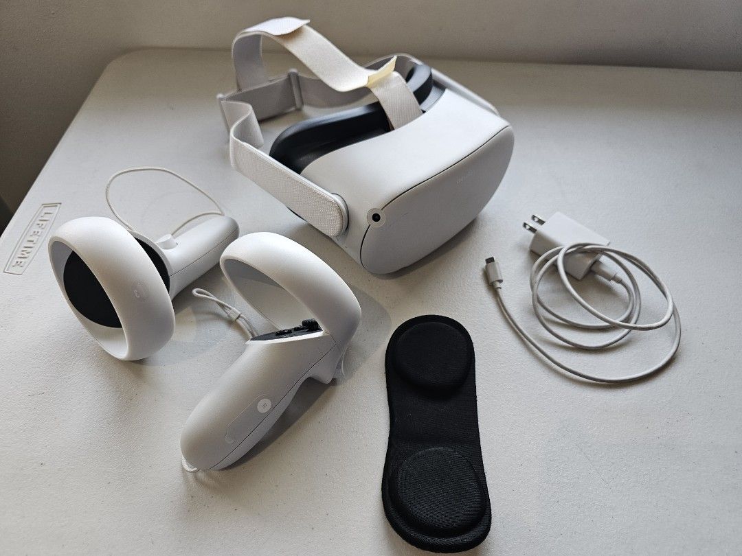 Meta Quest 2 (Oculus) VR Headset (With Accessories and Case) (Category: Virtual Reality) located in Manila. Submitted by tech_by_trx (Listing ID 1427535478, Image 1). Description: Oculus Quest 2 VR headset 128GB RFS: Seldom used, handled with care; Apps and activity mostly Beat Saber, Youtube and Meta Videos; Was Able to connect to Steam for VR games (F1 and Dirt Rally 2.0) -two controllers -charging cable -power adapter -lens protector -Included