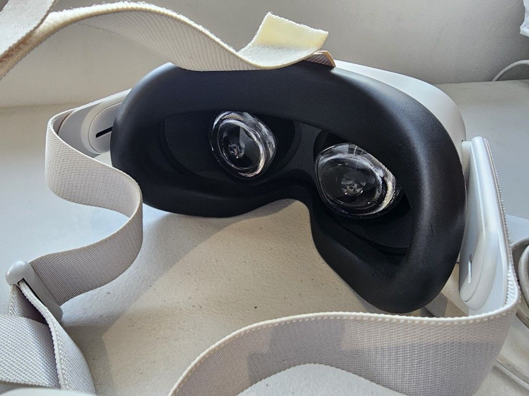 Meta Quest 2 (Oculus) VR Headset (With Accessories and Case) (Category: Virtual Reality) located in Manila. Submitted by tech_by_trx (Listing ID 1427535478, Image 3). Description: Oculus Quest 2 VR headset 128GB RFS: Seldom used, handled with care; Apps and activity mostly Beat Saber, Youtube and Meta Videos; Was Able to connect to Steam for VR games (F1 and Dirt Rally 2.0) -two controllers -charging cable -power adapter -lens protector -Included