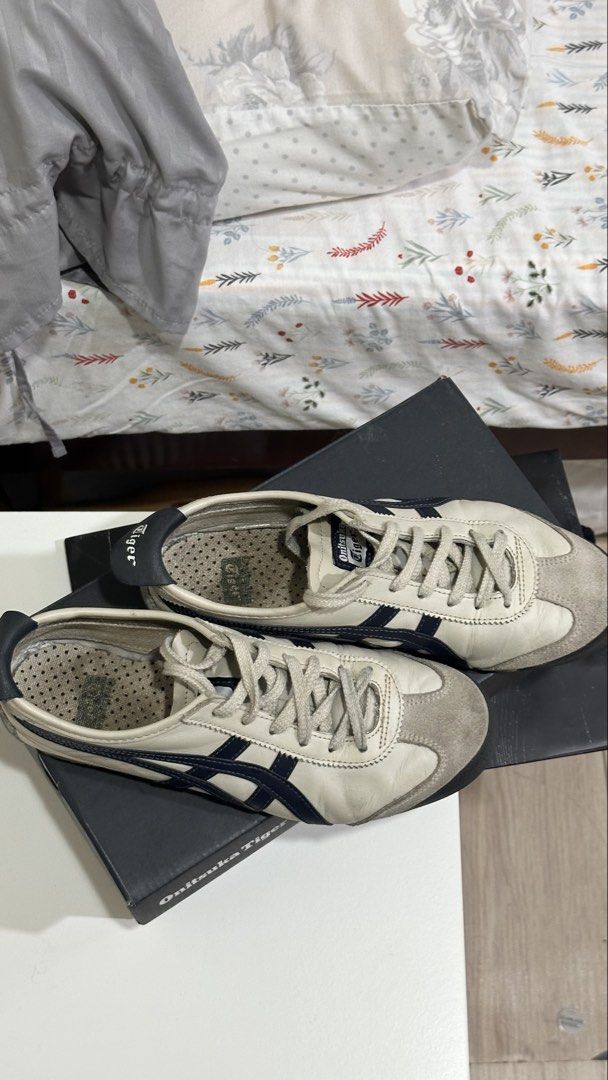 Onitsuka Tiger Mexico 66 (Birch/Peacoat) (Category: Sneakers) located in Cebu City. Submitted by cmy___ (Listing ID 1427563455, Image 3). Description: These are a size 7.5 women’s, used these a few times the last 2 years only, only noticeable flaws are the blue markings on the back of the shoe (see photos) Otherwise in great condition! :) 7.5/10 Still comes with the box and paper bag got this in Onitsuka Ayala Center Cebu when it was still open .