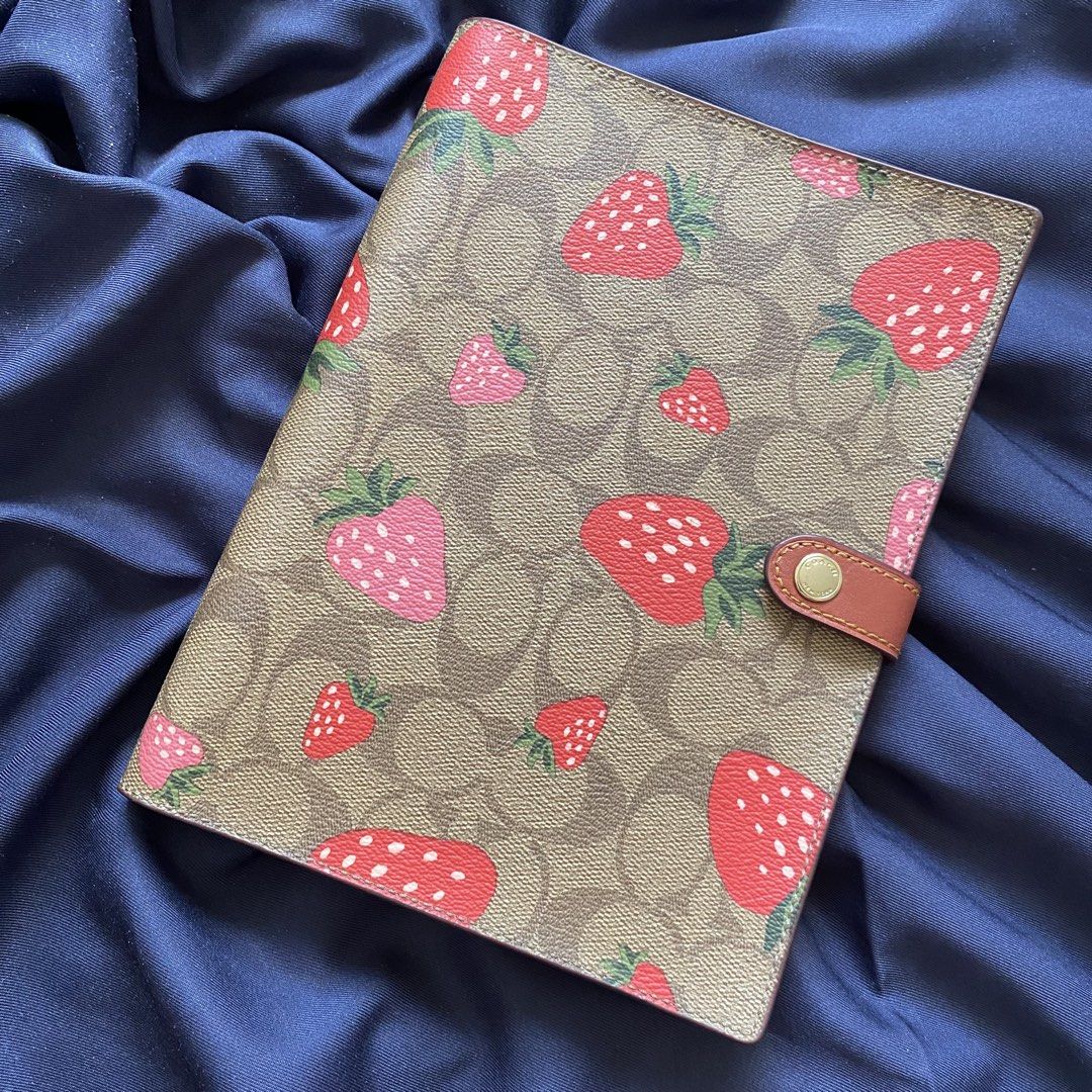 Original Coach RARE Strawberry Print Notebook (Category: Stationery & School Supplies) located in Quezon City. Submitted by chamgarciaa (Listing ID 1427504109, Image 1). Description: Repriced: 3500 from 3800 Bought from US. Never used, nasa cabinet lang. Rare fruit print. Shipping should be shouldered by buyer. (Grab, Lalamove, LBC, etc.) Payment first! .