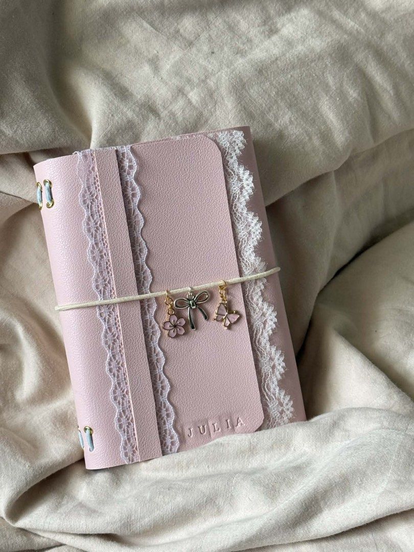PERSONALIZED LEATHER JOURNAL FOR AS LOW AS 250 PESOS (Category: Stationery & School Supplies) located in Makati City. Submitted by dreamy.pagesph (Listing ID 1427575801, Image 1). Description: INCLUSIONS: • FAUX LEATHER FOLIO WITH 8 HOLES (CAN FIT UP TO 4 NOTEBOOKS) • GROMMETS • STRING CORD • 2 NOTEBOOKS • 1 CHARM • ENGRAVING (< 5 CHARACTERS FREE) BASE PRICE A6: • BIFOLD - 250 PHP • TRIFOLD - 280 PHP A5 • BIFOLD - 350 PHP • TRIFOLD - 380 PHP ADDI