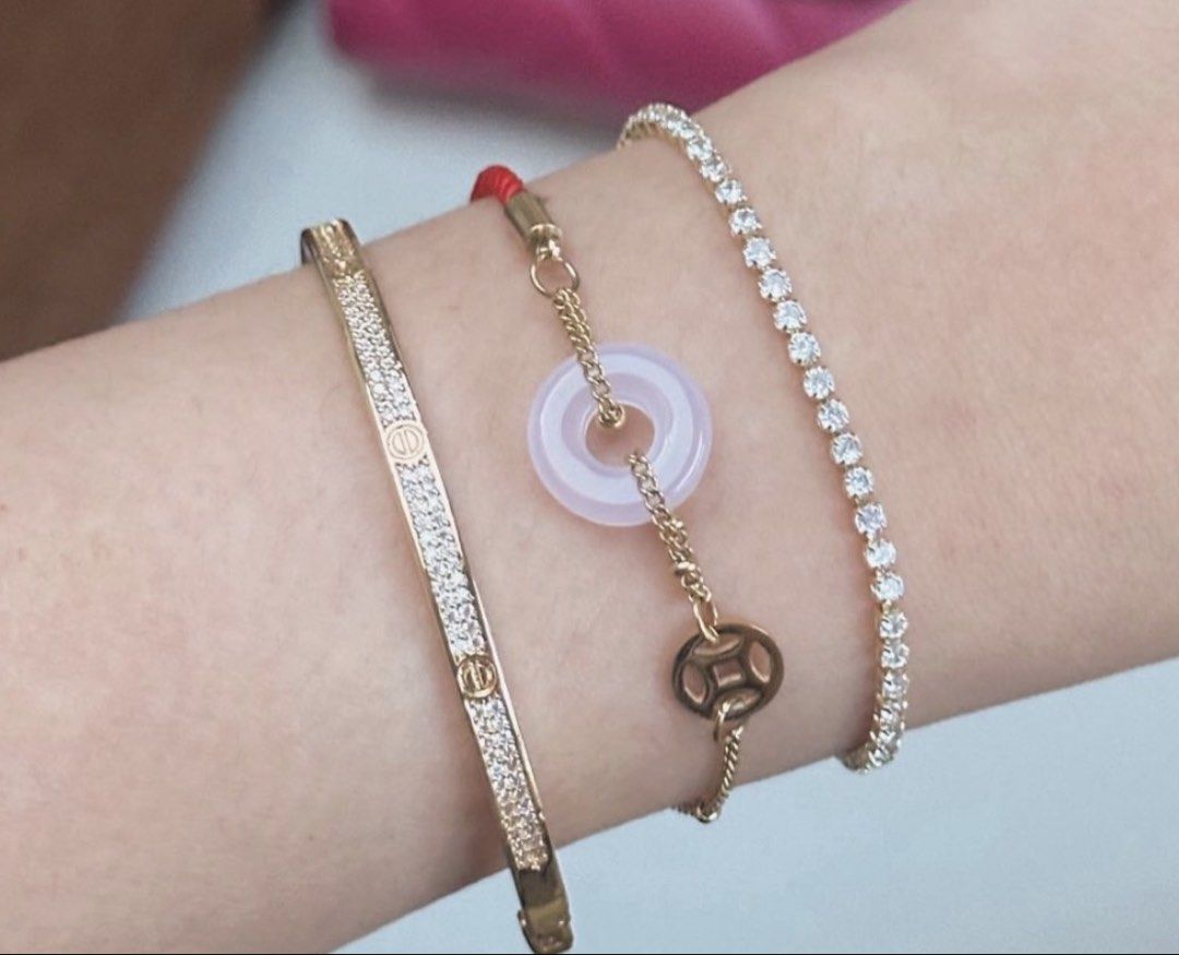 Pink Jade Red String Bracelet (Category: Bracelets) located in Paranaque City. Submitted by seektoshop (Listing ID 1427504694, Image 3). Description: Gemstone: PINK JADE Red string and Stainless Steel with Money symbol coin charm. Adjustable size comes with extenders You are the best proof of the wonders of this Pink Jade Red String bracelet. This charm is so powerful to het sudden surge of money - such as bonus, commissions, unexpected payments.