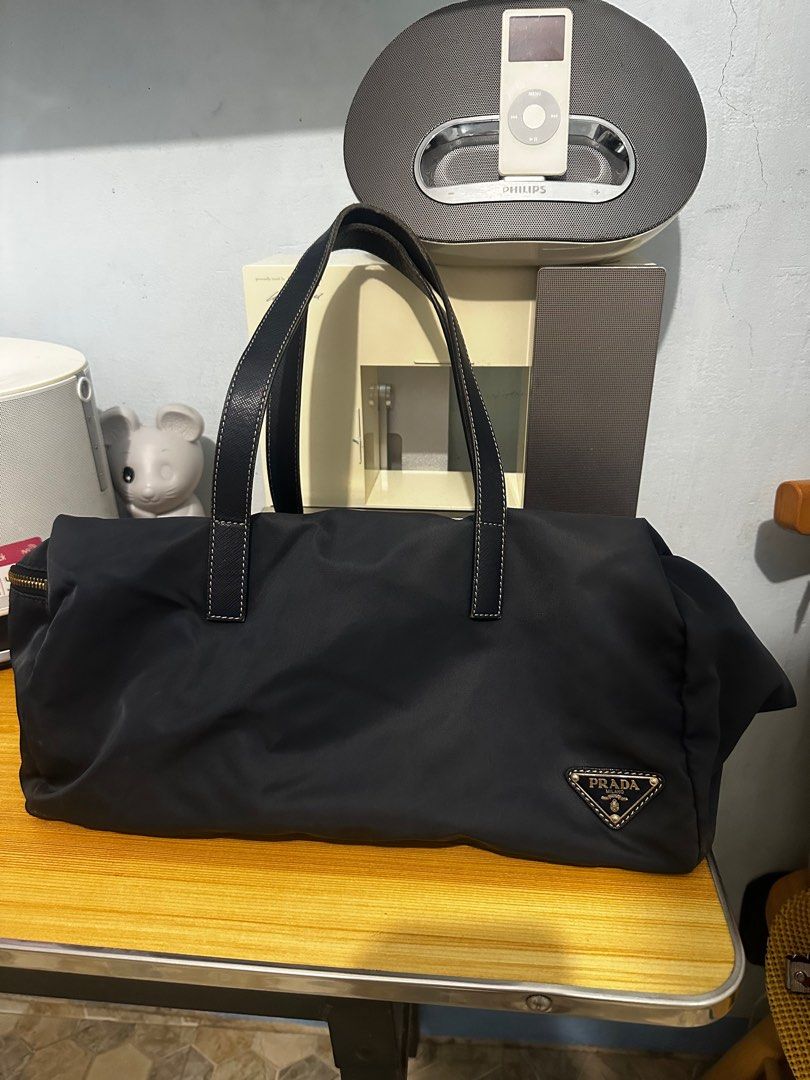 Prada Hand Bag Nylon 2way Black BL0567 (Category: Luxury Bags & Wallets) located in Makati City. Submitted by rhamshoppe2027 (Listing ID 1427608699, Image 1). Description: For sale only Authentic Prada Nylon texture saffiano leather handle Purchase abroad,japan 8.5/10 verygood condtion Needs cleaning Gold hardware Clean inside ,minor issue slight zipper tarnish Used condition For serious buyer only Makati area Lalamove/gcash/bank payment .
