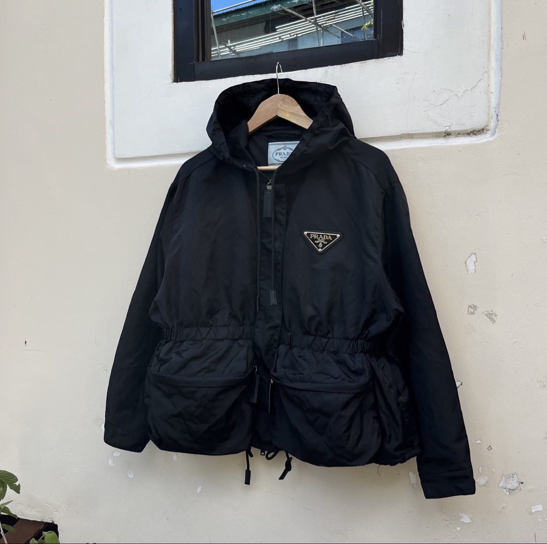 PRADA RE NYLON GABARDINE JACKET (Category: Luxury Apparel) located in Baguio. Submitted by closetgc.clothingshop (Listing ID 1427495491, Image 2). Description: Prada Re-nylon gabardine jacket In excellent condition All intact with hood Best fit medium - semi large womens .