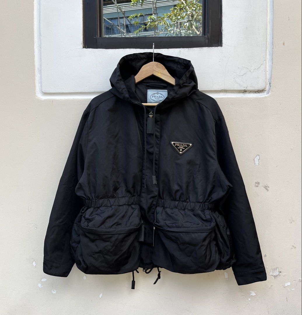 PRADA RE NYLON GABARDINE JACKET (Category: Luxury Apparel) located in Baguio. Submitted by closetgc.clothingshop (Listing ID 1427495491, Image 1). Description: Prada Re-nylon gabardine jacket In excellent condition All intact with hood Best fit medium - semi large womens .