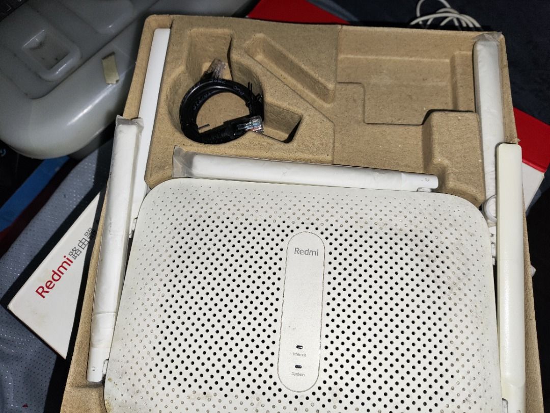 Xiaomi Router Redmi AC 2100 (Category: Networking) located in Caloocan City. Submitted by emil4865265 (Listing ID 1427577481, Image 2). Description: - REDMI AC 2100 Router - Modern and stylish design - Provides fast and reliable internet connectivity 2 PIECES AVAILABLE budget-friendly, high-performance gigabit wireless router featuring 6 antennas and 6-way signal amplifiers for wide coverage. It offers combined dual-band speeds of up to 2033 Mbps