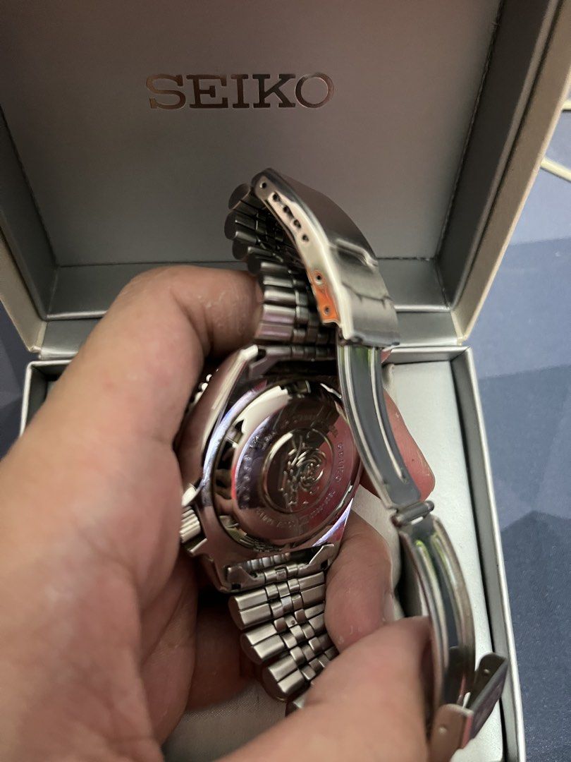 Seiko Automatic Diver Watch (Category: Men's Watches) located in Manila. Submitted by moopoint18 (Listing ID 1427573507, Image 3). Description: Seiko SKX007 Diver’s Watch Pepsi GMT mod Very good reserve power With Arabic Date No scratches With extra dial Modded by Watch MNL Rarely used With box and pillow Legit seiko Php 10k slight nego.