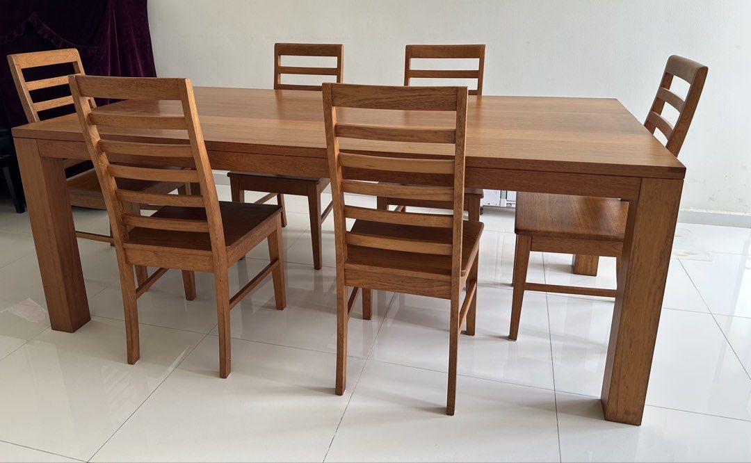 Solid wood dining table (Category: Tables & Sets) located in Singapore. Submitted by hongmoguai (Listing ID 1427515978, Image 1). Description: Solid wood dining table, well used. Size: 200 cm x 100 cm x 75cm Self pickup. .