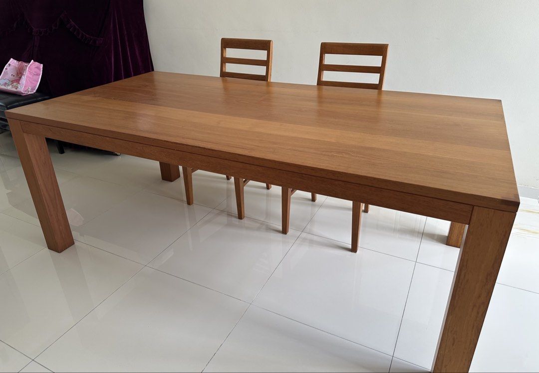 Solid wood dining table (Category: Tables & Sets) located in Singapore. Submitted by hongmoguai (Listing ID 1427515978, Image 3). Description: Solid wood dining table, well used. Size: 200 cm x 100 cm x 75cm Self pickup. .