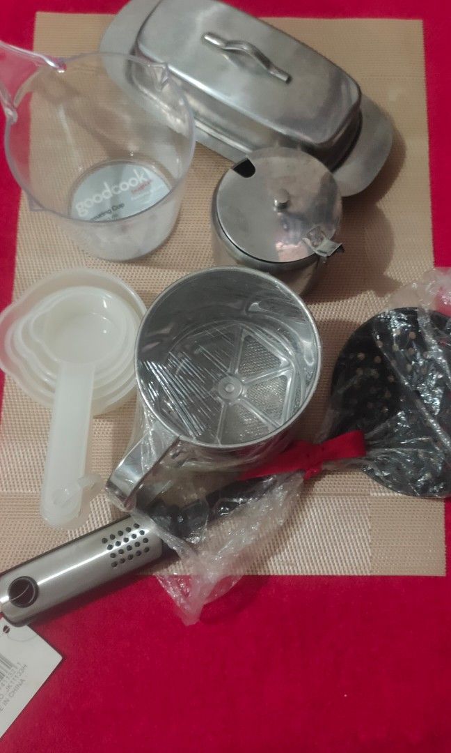 Stainless Steel Kitchen Set (w freebies) (Category: Other Kitchenware & Tableware) located in Imus. Submitted by jane369 (Listing ID 1416586773, Image 2). Description: Vintage Stainless steel kitchen set includes a butter dish with a lid, and a small container with a lid. It is suitable for serving butter, condiments, or other small items. The design is simple and functional, perfect for everyday use. others in the pics are freebies.