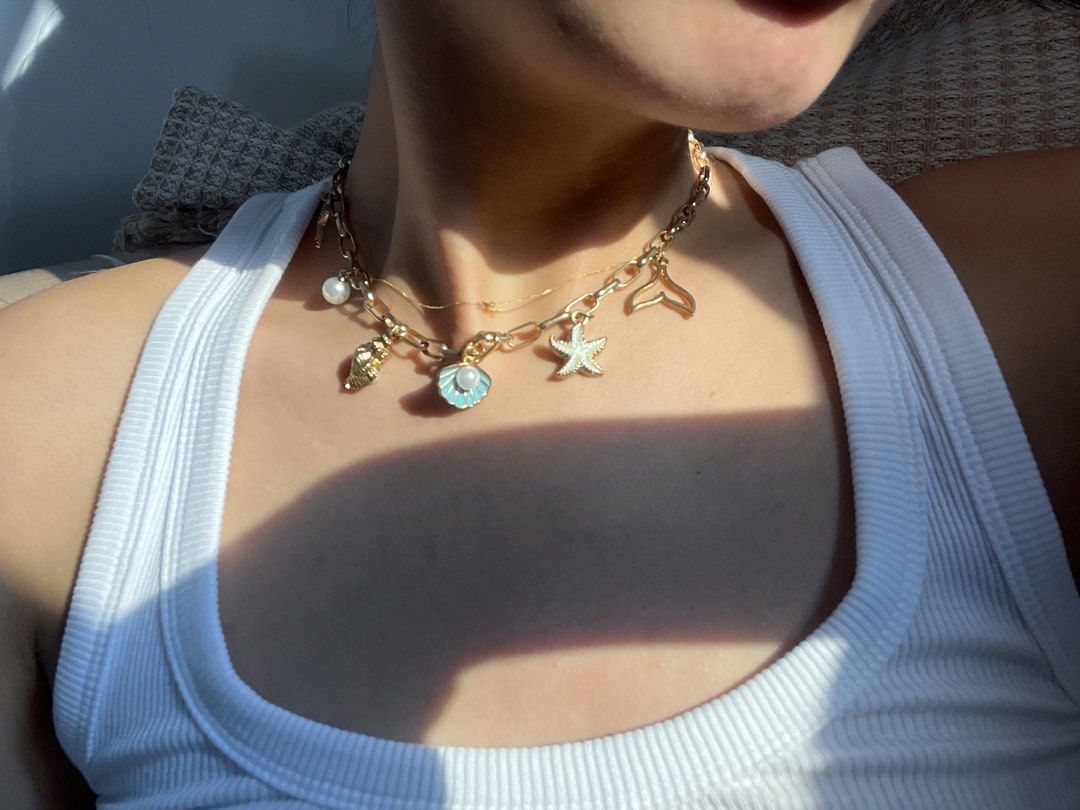 Summer Accessories (Category: Body Jewelry) located in Pasay City. Submitted by cesioa (Listing ID 1427504459, Image 3). Description: Take All Shell Necklace has signs of used (little tarnish) The rest is never used .