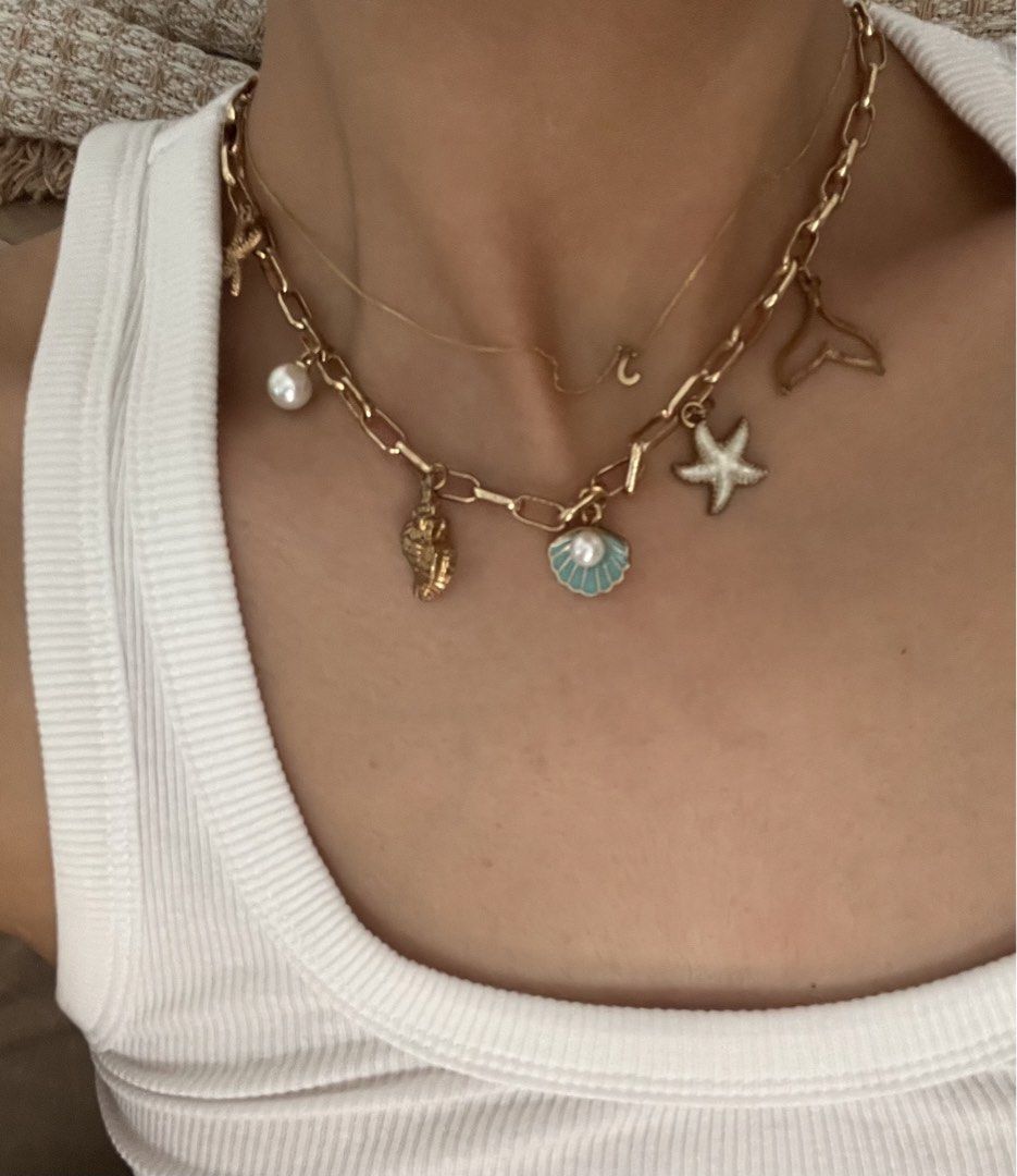 Summer Accessories (Category: Body Jewelry) located in Pasay City. Submitted by cesioa (Listing ID 1427504459, Image 1). Description: Take All Shell Necklace has signs of used (little tarnish) The rest is never used .