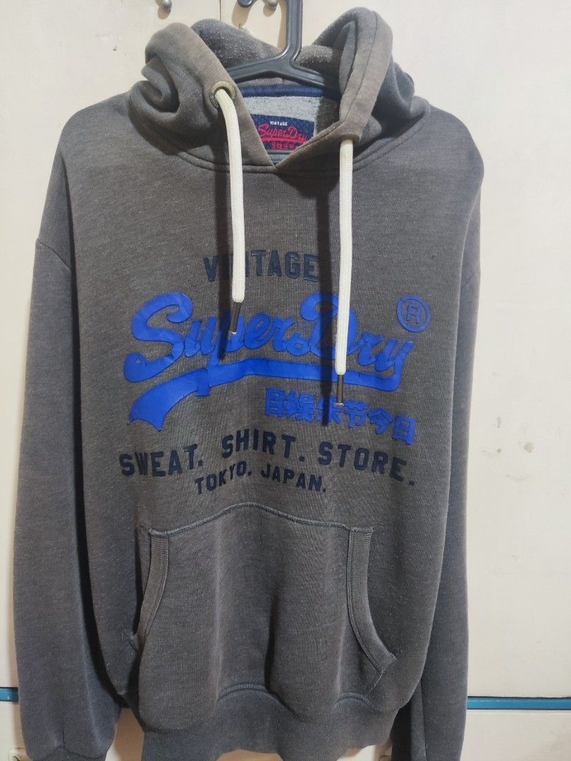 Superdry Vintage Hoodie (Category: Hoodies) located in Quezon City. Submitted by ryan0529 (Listing ID 1427558653, Image 1). Description: Superdry Vintage Hoodie Lighlty used. 9.2/10 No flaws. 24x28 Fits L to XL Guaranteed Authentic. rfs: decluttering 500 only!.