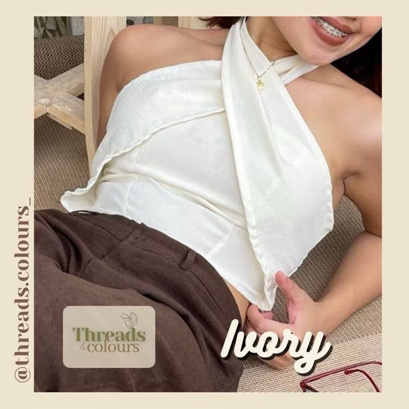 threads & colours iya multiway top (Category: Sleeveless) located in Quezon City. Submitted by jagermasterrr (Listing ID 1427511555, Image 1). Description: iya multiway smocked tube top halter top s-m (stretchable) 4 ways to style it.