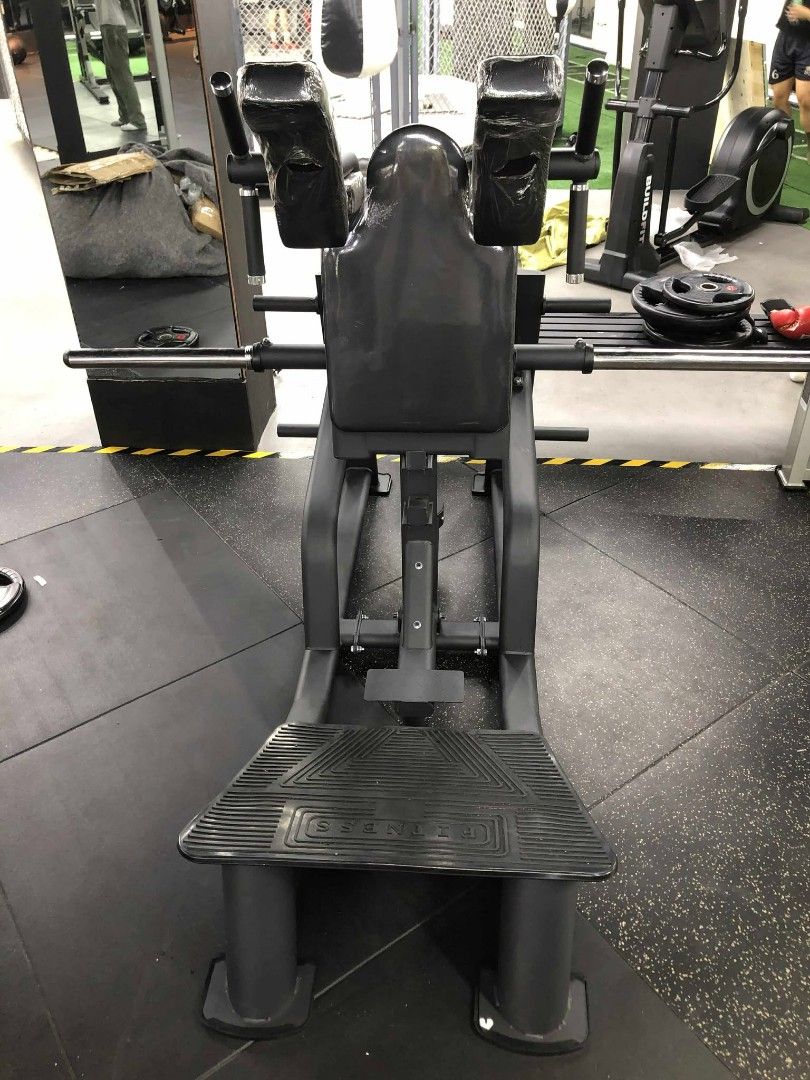 V Squat (Category: Weights & Dumbbells) located in Caloocan City. Submitted by protein888 (Listing ID 1427624529, Image 1). Description: Heavy-duty squat machine designed for commercial gym use. Features a padded back and shoulder support for comfort and safety. Includes a foot platform and weight bar. Ideal for building lower body strength. Sturdy construction ensures stability during workouts. Perfect for serious fitness enthusiasts..