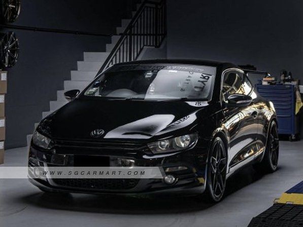 Volkswagen Scirocco 1.4 TSI DSG (A) (Category: Used Cars) located in Singapore. Submitted by pa_pa_shop (Listing ID 1322177012, Image 2). Description: Vehicle Features 1.4L TSI turbocharged engine paired with 7 speed DSG gearbox, FWD, ABS, SRS airbags, Traction control, Auto headlights and wipers, Paddle shifters. Accessories LTA approved Remus exhaust, XYZ coilovers, SSW 19 inch sports rims, Customised extended spoiler, Rewrapped front leather s