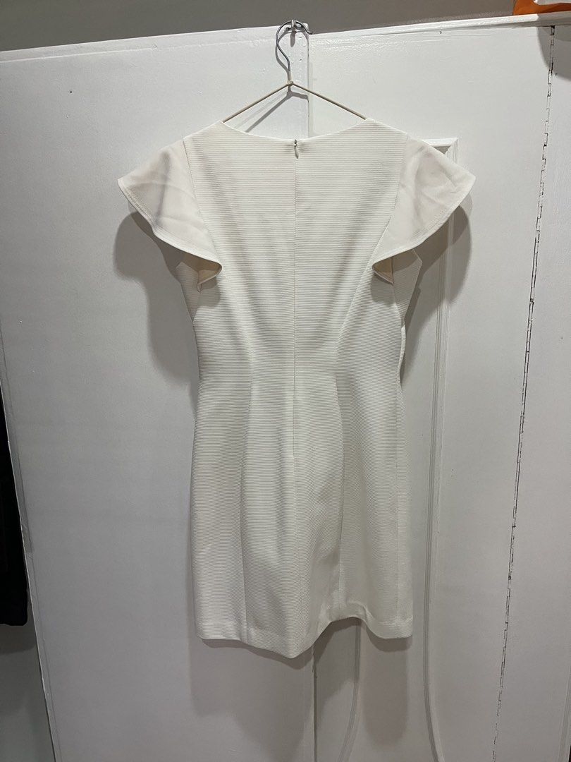 White Dress with Ruffle Sleeves (Category: Dresses) located in Manila. Submitted by royalbear822 (Listing ID 1427574146, Image 2). Description: White office dress.
