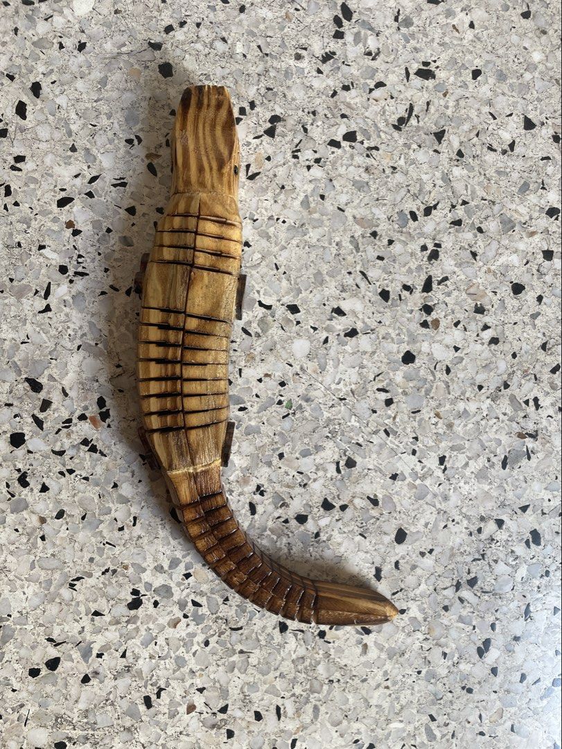 Wooden Moving Crocodile Toy (Category: Educational & Learning Toys) located in Quezon City. Submitted by liama (Listing ID 1427531145, Image 2). Description: Cool handcrafted toy frm India For children, adults alike Interlocking segments of mango wood : tail and head move independently like a real crocodile! Buyer books/pays for pickup : QC: EDSA-GMA area; OR if u r in vicinity i cn jst hand it over to u .