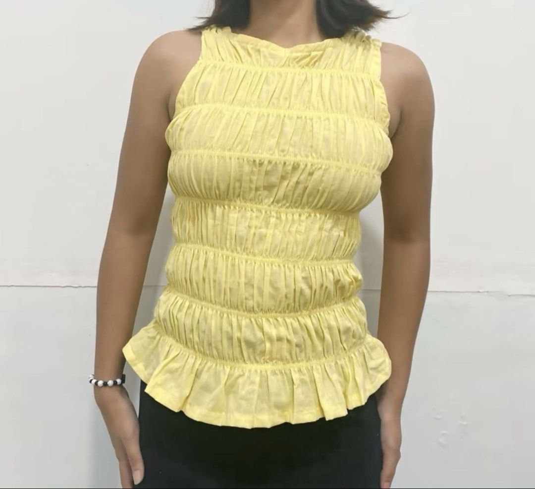 Yellow Garterized Top (Category: Sleeveless) located in San Pedro. Submitted by a_styles (Listing ID 1427577734, Image 1). Description: ⭐️ Worn once ⭐️ S-L (check size chart) ⭐️ free size (stretchy) ⭐️ DM for when worn pics 📍Pacita, San Pedro, Laguna MOP💰: GCASH/Maya/SeaBank/BPI MOD🚚: Lalamove/JNT help tags: carino top.