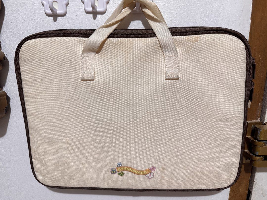 BTS Dynamite Laptop Sleeve (Category: Laptop Bags & Sleeves) located in Muntinlupa City. Submitted by mimitatsboutique (Listing ID 1427704033, Image 3). Description: - just need minimal cleaning - from korea - authentic TinyTan.