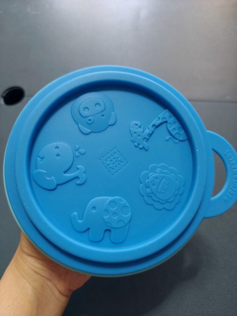 BUNDLE - BooginHead, Marcus & Marcus Baby Feeding Set & AVENT Sippy Cup (Category: Weaning & Toddler Feeding) located in Manila. Submitted by anneesp (Listing ID 1427762210, Image 3). Description: Set includes a BooginHead Super Grip Bowl, a Marcus & Marcus silicone bowl with lid, and a baby sippy cup. The BooginHead bowl has a unique suction base. The Marcus & Marcus bowl is made of silicone and has a lid. The sippy cup has handles and a lid. Al