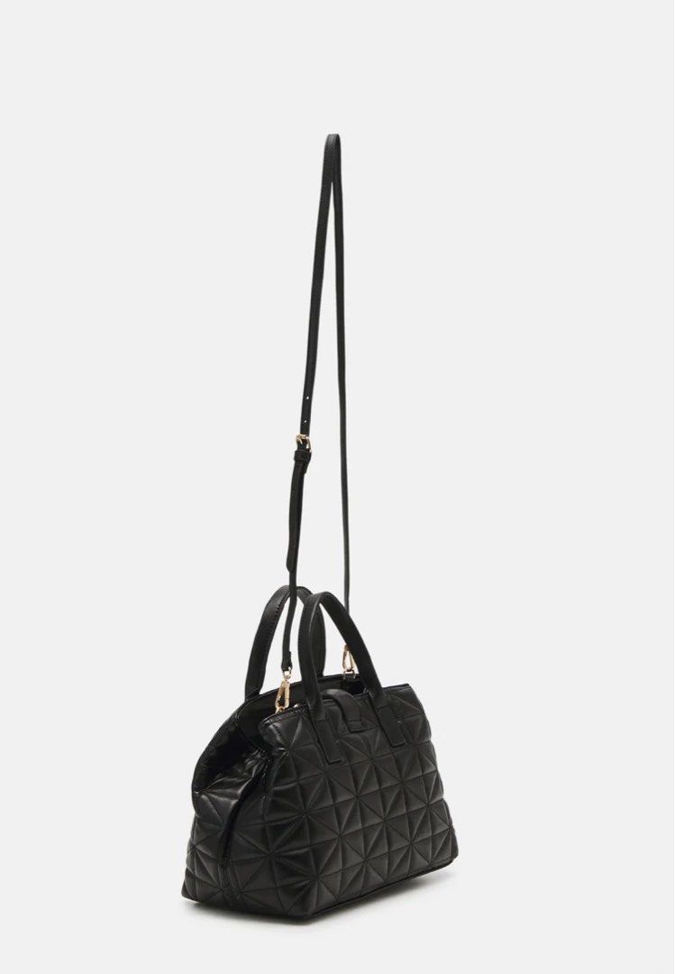 Call It Spring QUINNY Quilted Satchel Bag (Category: Luxury Bags & Wallets) located in Pasig City. Submitted by eiannn (Listing ID 1427748372, Image 2). Description: QUINNY Quilted Satchel Bag Color: Black Brand Name: Call It Spring Bag Dimension: 28 L X 15 W X 22 H Cm Material: Synthetic Type: Satchel Bag Size: Medium Fastener: Zip Fashion Segment: Premium Spacious and stylish, perfect for carrying all your daily essentials with ease, featuring 