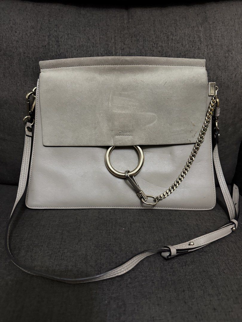 Chloe Faye Bag (Category: Luxury Bags & Wallets) located in Pasig City. Submitted by armoire_deluxe (Listing ID 1427718529, Image 1). Description: - Chloe Faye shoulder bag - Elegant gray color - Features a stylish layered design - Iconic ring hardware.