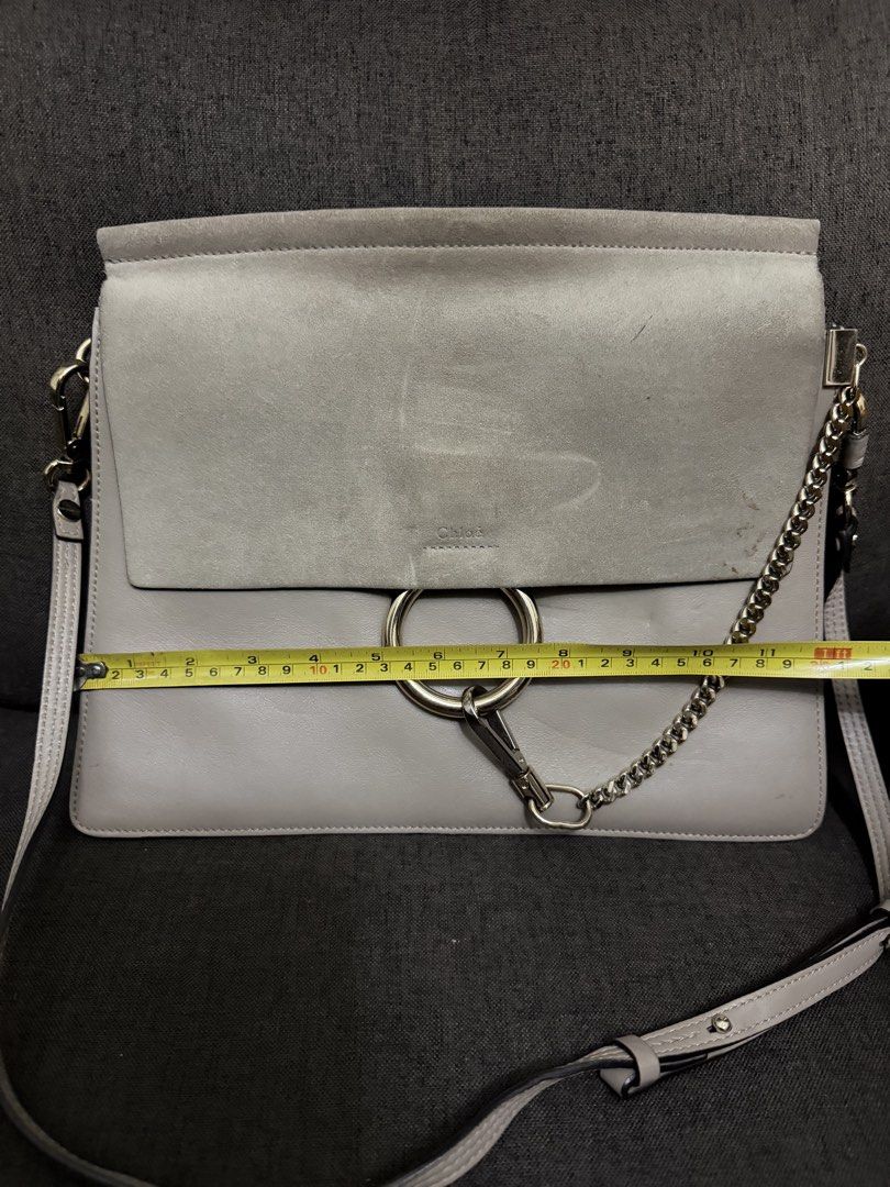 Chloe Faye Bag (Category: Luxury Bags & Wallets) located in Pasig City. Submitted by armoire_deluxe (Listing ID 1427718529, Image 3). Description: - Chloe Faye shoulder bag - Elegant gray color - Features a stylish layered design - Iconic ring hardware.
