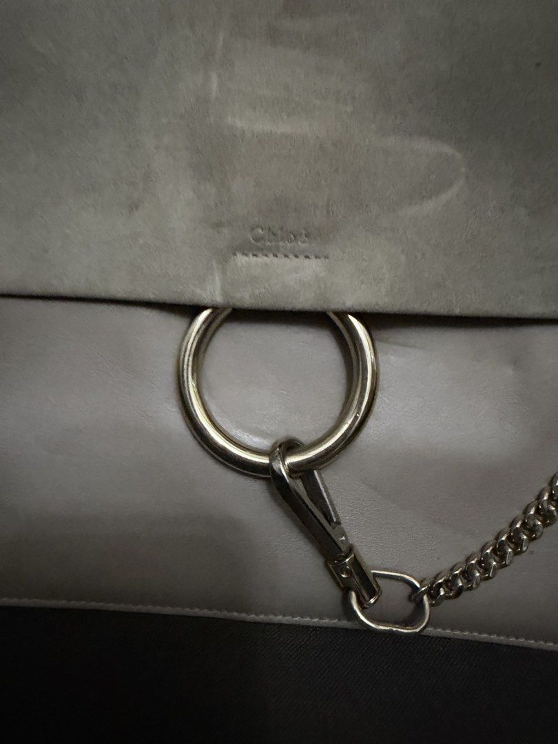 Chloe Faye Bag (Category: Luxury Bags & Wallets) located in Pasig City. Submitted by armoire_deluxe (Listing ID 1427718529, Image 2). Description: - Chloe Faye shoulder bag - Elegant gray color - Features a stylish layered design - Iconic ring hardware.
