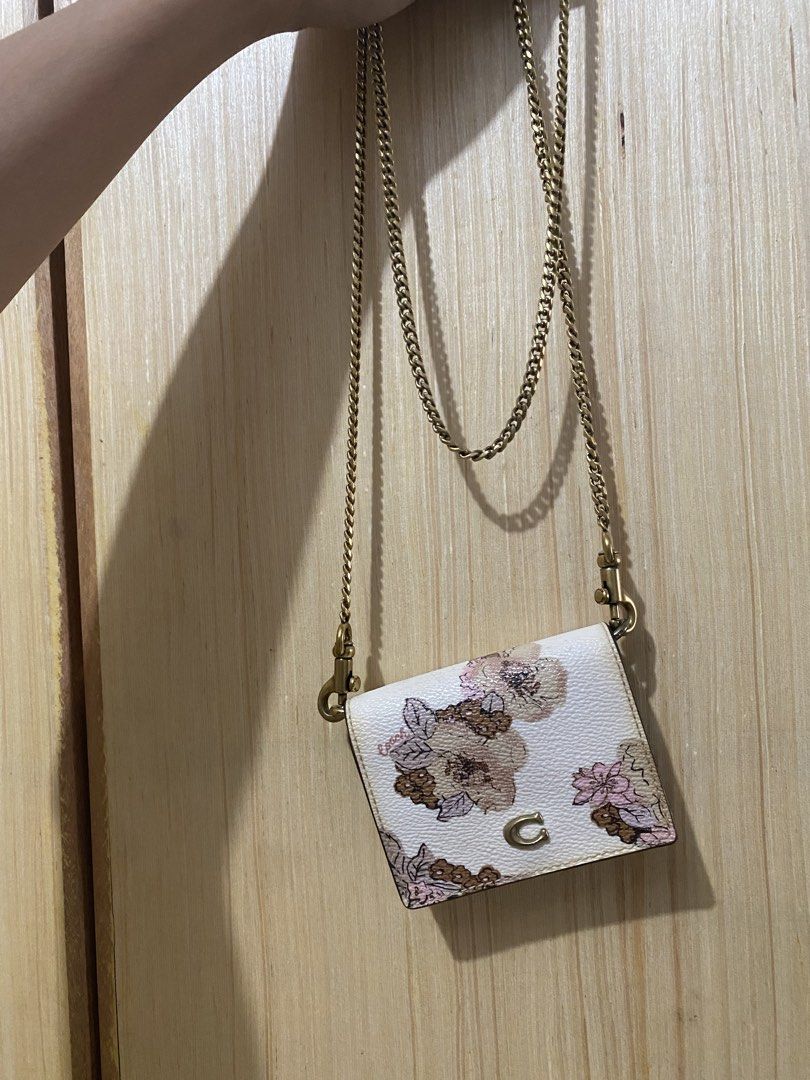 Coach Floral Chain Wallet (Category: Luxury Bags & Wallets) located in Cainta. Submitted by moonchild1215 (Listing ID 1427646868, Image 1). Description: .